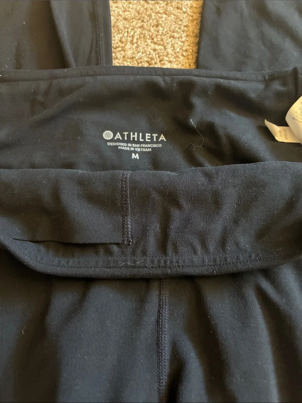 Athleta Black Contender Laser Cut Perforated Pocket 7/8 Leggings size M - Picture 2 of 6